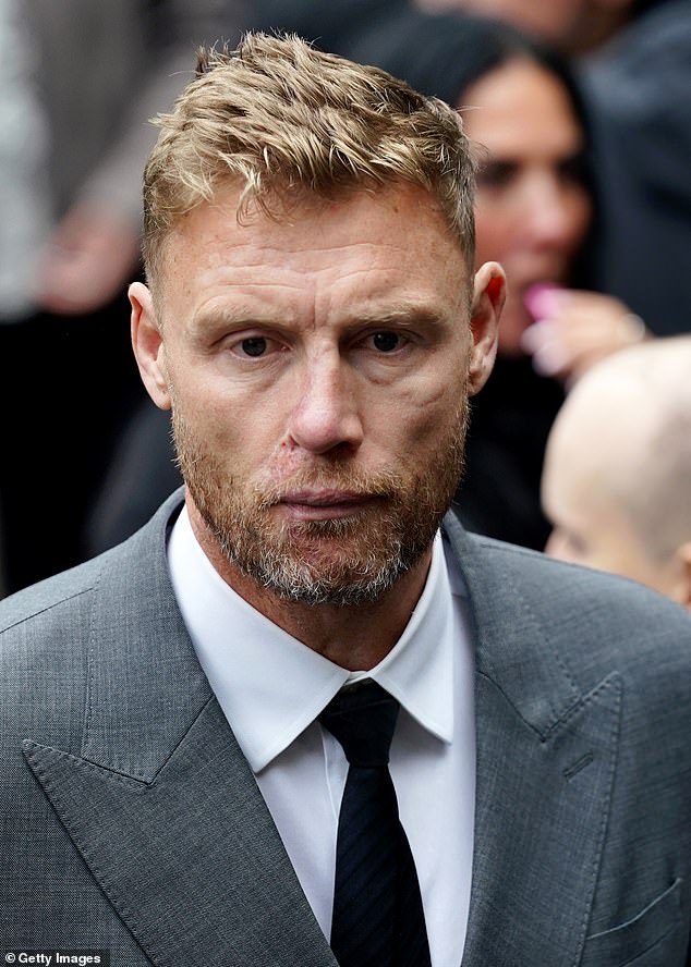 Former international cricketer Freddie Flintoff opted for a smart grey suit for the occasion with a white shirt and black tie
