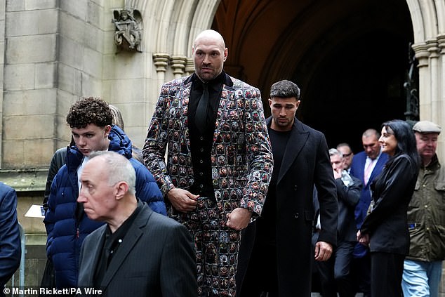 Tyson Fury and Tommy Fury depart after the funeral service for Ricky Hatton today