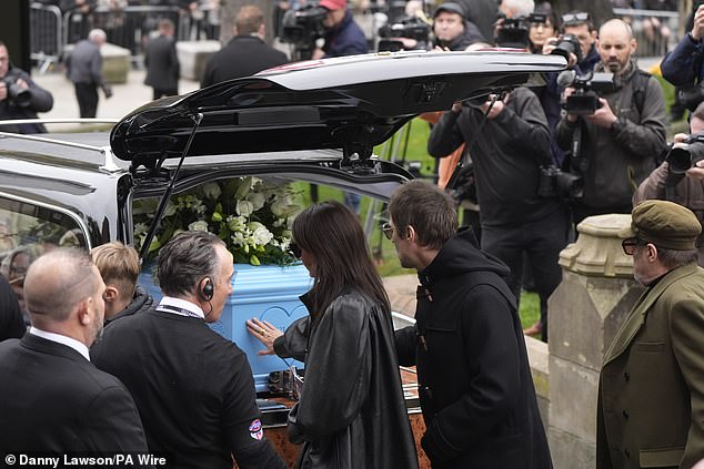 Gallagher and Gwyther touch Hatton's coffin after the funeral