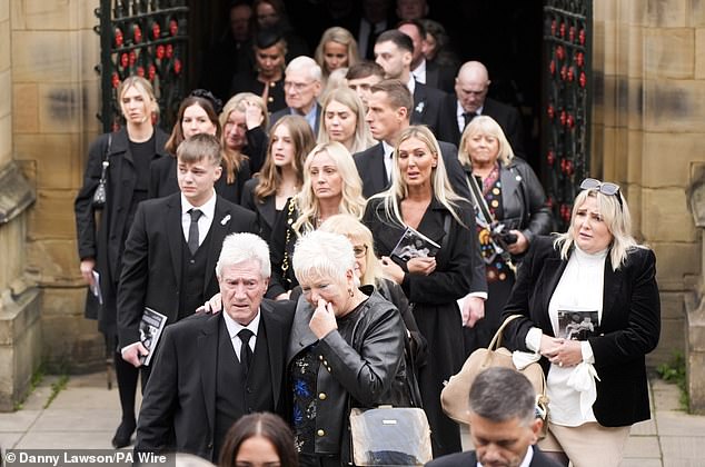 Ray and Carol Hatton leave Manchester Cathedral following the funeral of their son today
