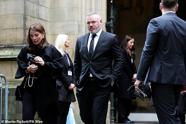 Wayne Rooney and Coleen Rooney depart after the funeral service for Ricky Hatton today