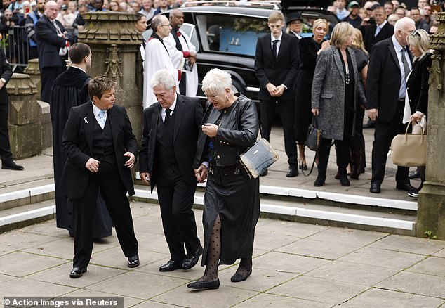 Ricky Hatton's parents Carol and Ray arrive at Manchester Cathedral for the service today