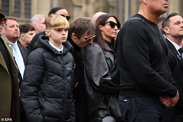 Liam Gallagher and partner Debbie Gwyther at Ricky Hatton's funeral at Manchester Cathedral