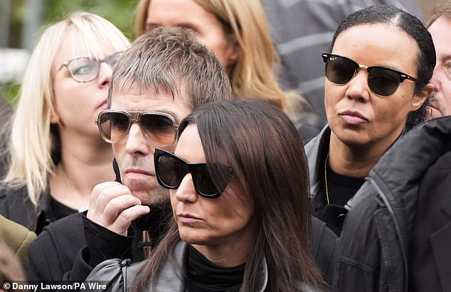 Liam Gallagher and partner Debbie Gwyther at Ricky Hatton's funeral at Manchester Cathedral