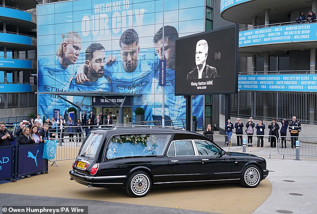 Ricky Hatton's hearse arrives at the Etihad Stadium this afternoon following the funeral
