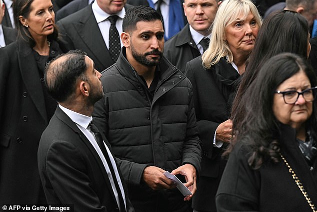 Former boxer Amir Khan arrives to attend the funeral of Ricky Hatton at Manchester Cathedral