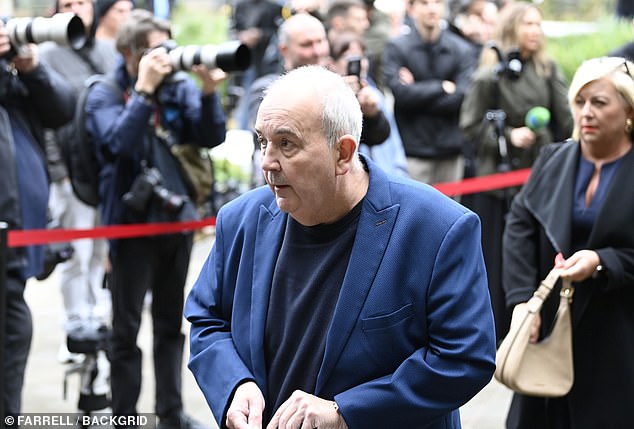 Darts legend Phil 'The Power' Taylor arrives at Manchester Cathedral this morning
