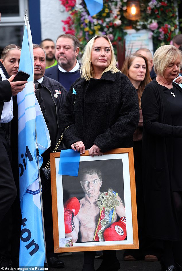 Mourners outside the Cheshire Cheese pub - Hatton's local - on Stockport Road in Hyde