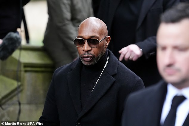Former boxer and trainer Pat Barrett departs after the funeral service for Ricky Hatton today