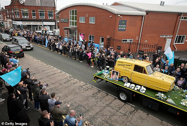 The funeral cortege of Ricky Hatton passes his boxing gym in his hometown of Hyde today