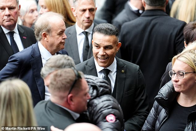 Former boxer Robin Reid arrives ahead of the funeral service for Ricky Hatton today