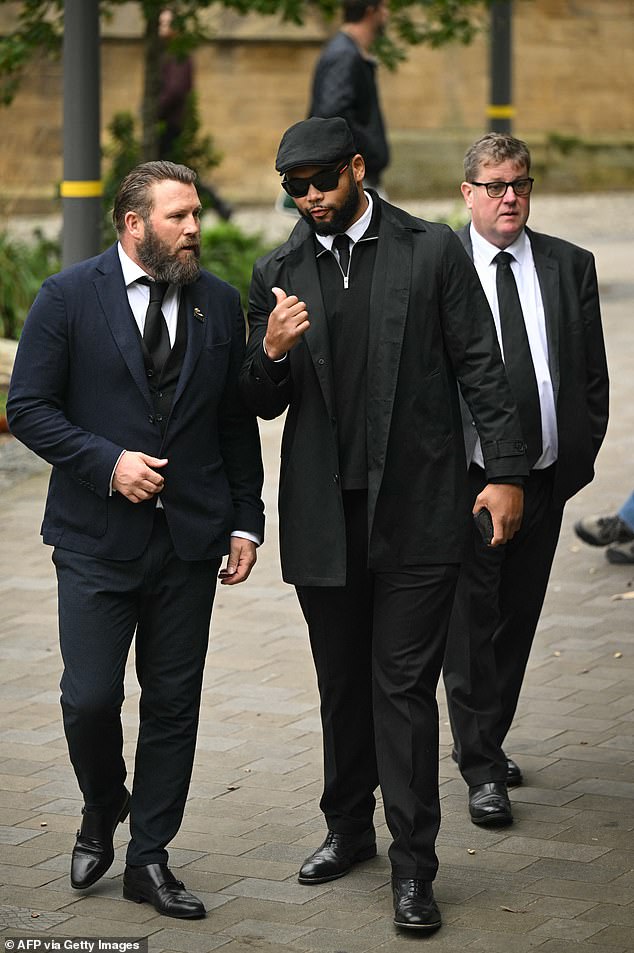 Former boxers Scott Welch and Frazer Clarke arrive at Manchester Cathedral this morning