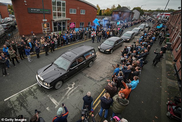The funeral cortege of Ricky Hatton passes his boxing gym in his hometown of Hyde today