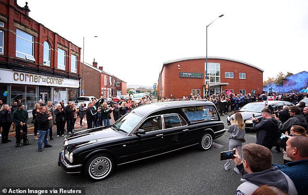 The cortege passes Hatton's Gym in Hyde, ahead of a funeral service for Ricky Hatton today