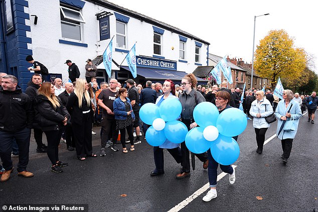 The cortege outside the Cheshire Cheese in Hyde today as Ricky Hatton's funeral takes place