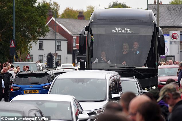A bus with a sign saying 'Only One Ricky Hatton' passes outside Hatton's Gym today