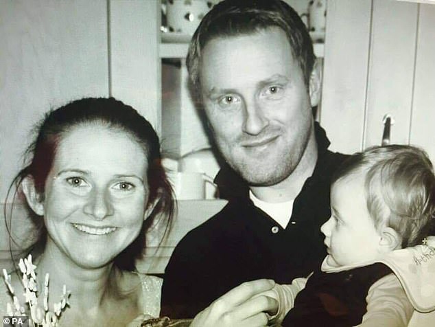 Rhian Mannings, her husband Paul Burke and their son George. George died aged one year, one week and one day on February 22 2012. Paul took his own life five days later