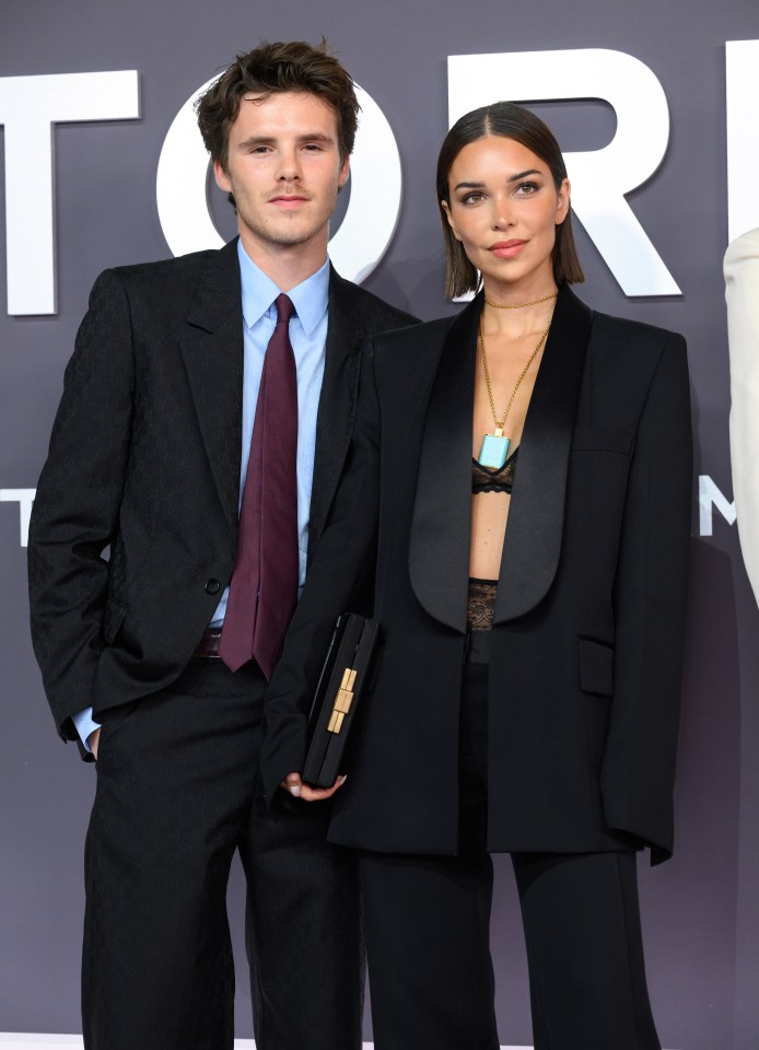 Cruz Beckham and Jackie Apostel attend the "Victoria Beckham" World Premiere.