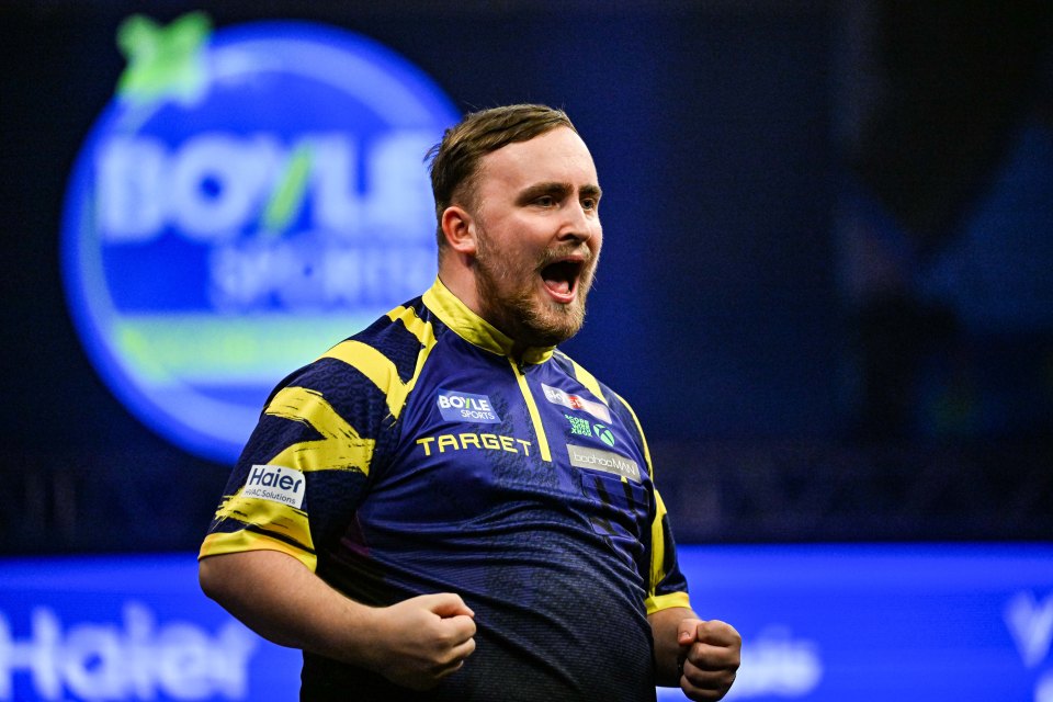 Luke Littler celebrating his first round match win at the 2025 PDC BoyleSports World Grand Prix Darts.