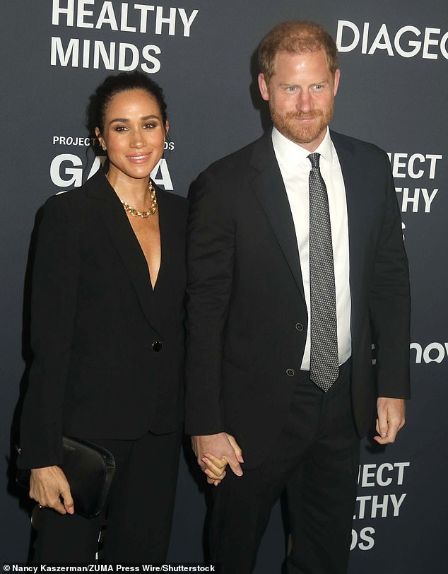 Harry and Meghan arrived hand in hand at the Project Healthy Minds gala on Thursday where they were named 'Humanitarians of the Year'. But although the former actress shot a number of soupy glances in her husband's direction, he looked largely furious, and his occasional smiles were tight little grimaces