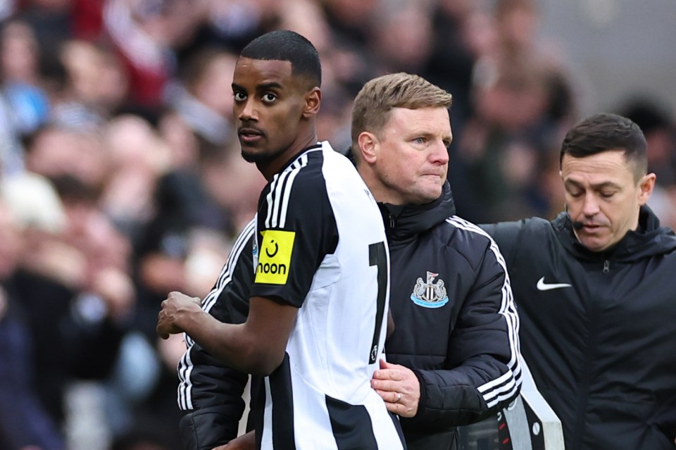 Newcastle United's Alexander Isak, Eddie Howe, and a third man on the sidelines during a match.