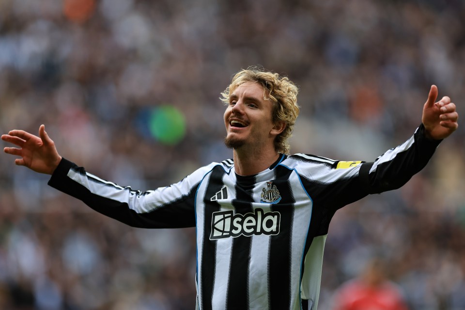 Nick Woltemade of Newcastle United celebrates after scoring a goal.