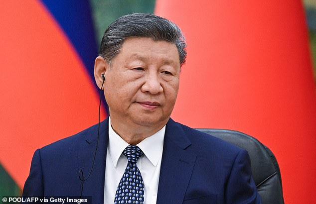 It was alleged in a pre-trial hearing that secrets were passed to an unnamed Chinese intelligence agent who then handed them over to Cai Qi, de facto chief of staff to President Xi Jinping (pictured)