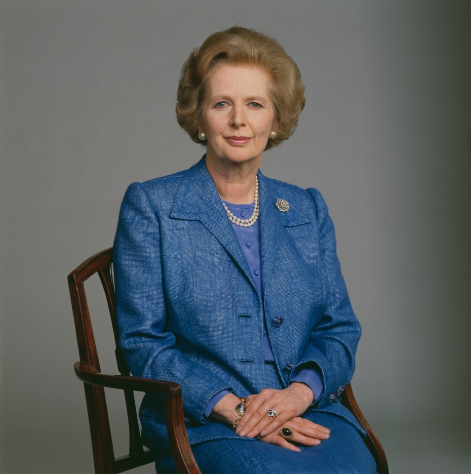 Margaret Thatcher, UK's first female Prime Minister, in a blue suit and pearl necklace, circa 1985.