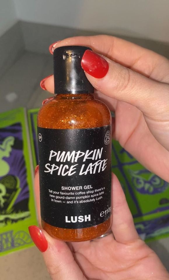 Hand holding a bottle of Lush Pumpkin Spice Latte Shower Gel.