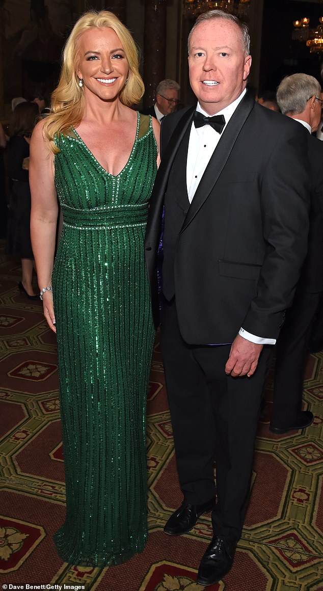 Mone and her husband, Doug Barrowman, at a charity dinner in 2019, before the Covid fallout