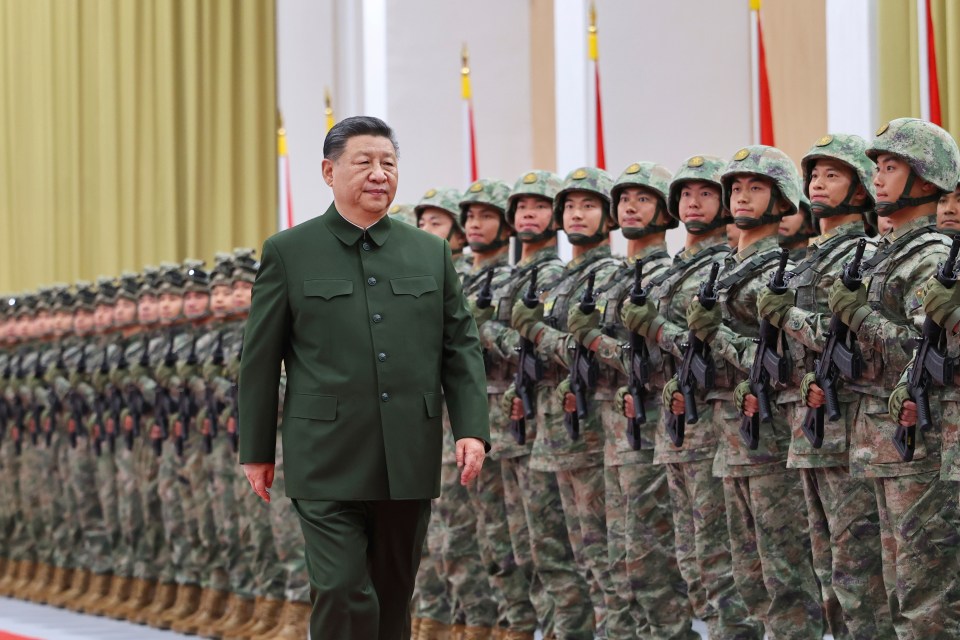 Chinese President Xi Jinping reviews troops from the Chinese People's Liberation Army.