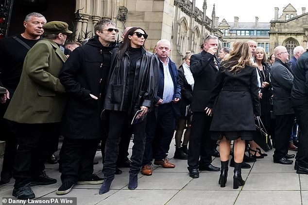 Liam Gallagher and partner Debbie Gwyther at Ricky Hatton's funeral at Manchester Cathedral