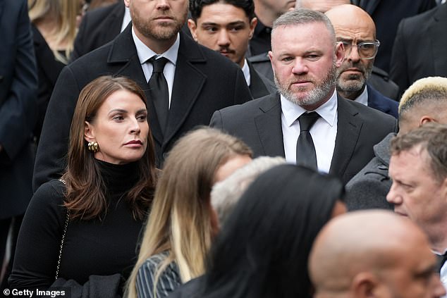 Coleen Rooney and Wayne Rooney attend the funeral of Ricky Hatton at Manchester Cathedral