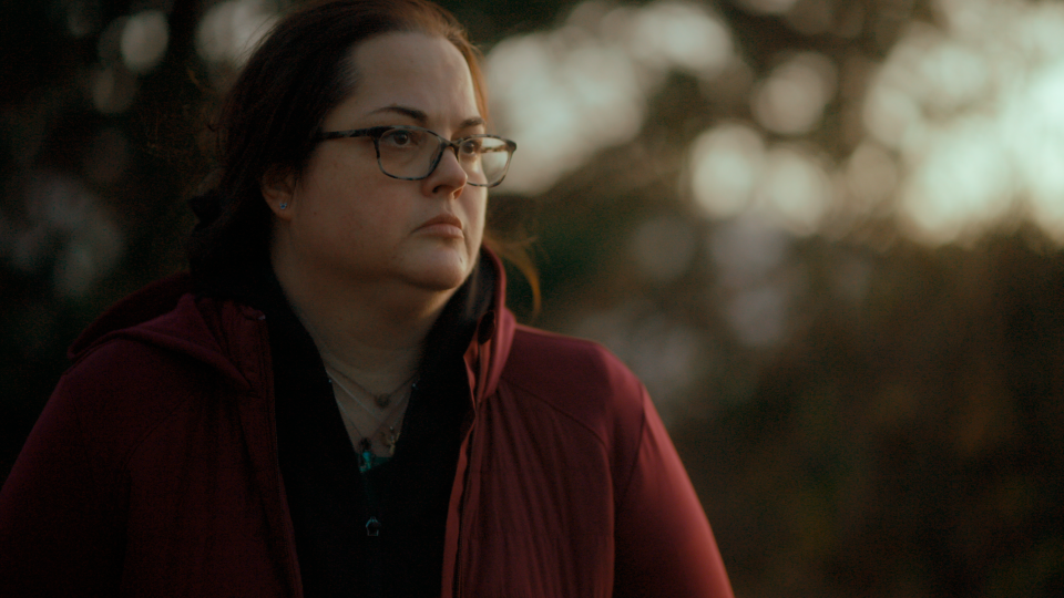 Kerri Rawson from "My Father, The BTK Killer" looks off to the right.