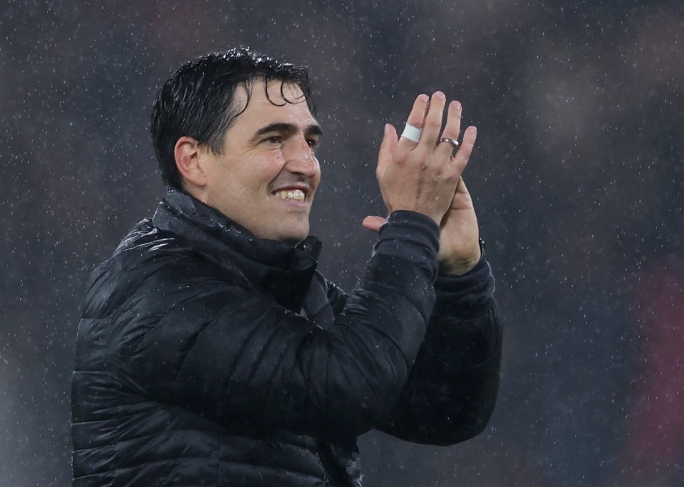 AFC Bournemouth manager Andoni Iraola applauds fans after the match.