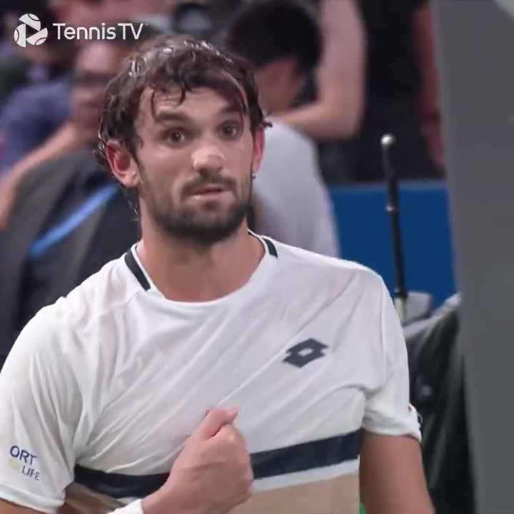Valentin Vacherot looks surprised after beating Novak Djokovic.
