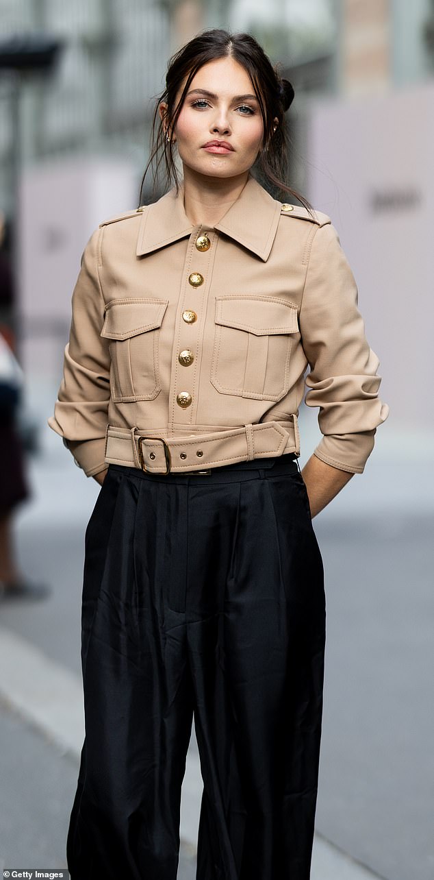 The 24-year-old posed for photographers ahead of the Zimmermann Womenswear show at Paris Fashion Week on Monday