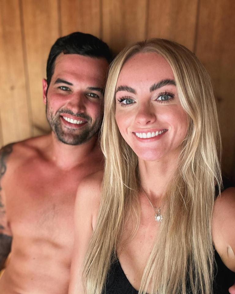 Katie McGlynn and Ricky Rayment smiling at the camera.