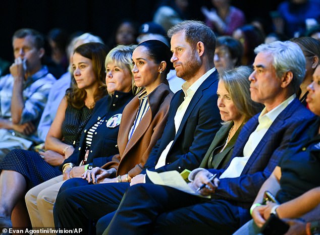 Meghan Markle, left, and Prince Harry, The Duke and Duchess of Sussex, attend Project Healthy Minds' World Mental Health Day Festival at Spring Studios on Friday, Oct. 10, 2025, in New York