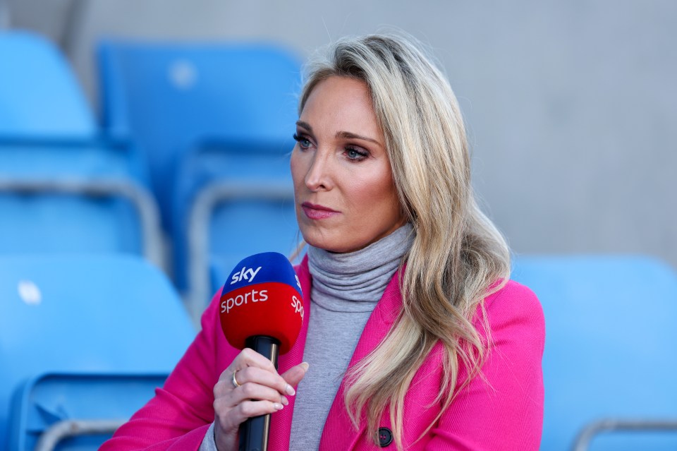 Jenna Brooks, Sky Sports reporter, holding a Sky Sports microphone.