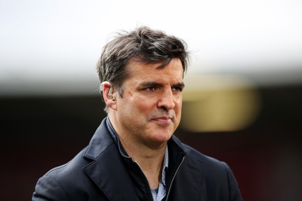 Brian Carney, Sky Sports Presenter, looks on.