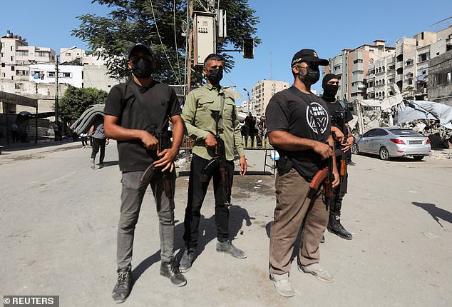 Palestinian police tand guard, amid a ceasefire between Israel and Hamas, in Gaza City, October 11, 2025