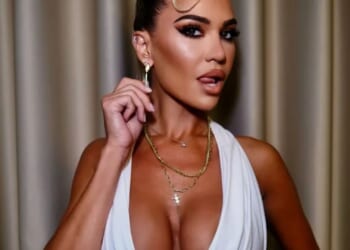 Christine McGuinness channels her inner Kim Kardashian in plunging white outfit
