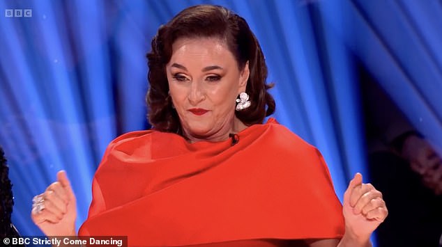 Shirley then shimmied her shoulders as she added: 'Your solo parts are down and groovy, and rock and roll and that little shake on the pecks when it went forward like that'