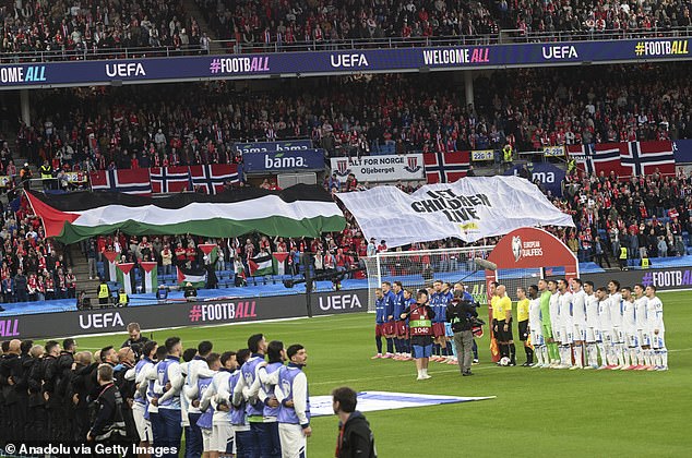 Protests continued inside the ground as a 'Let Children Live' banner was unfurled in the stands