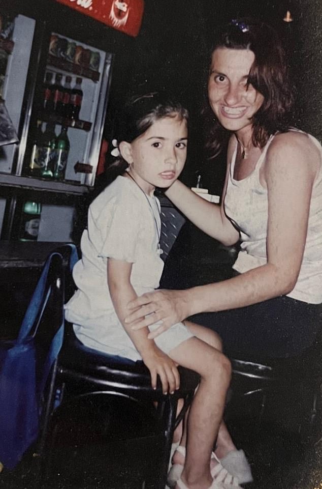 Stella, 7, and her mother Galina at Galina's second job as a barista; her main job was teaching