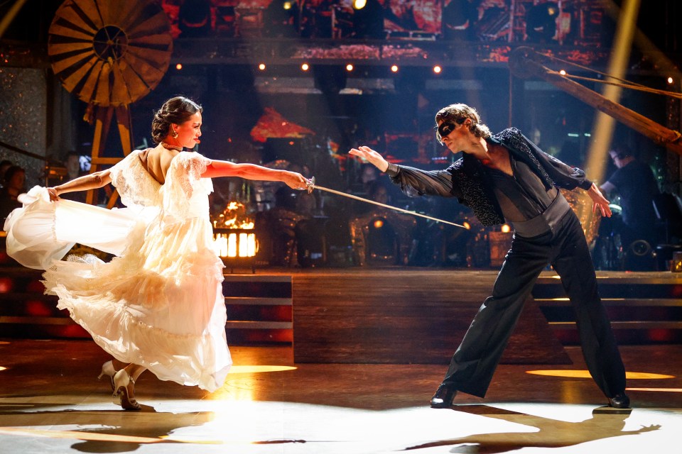 Katya Jones and Lewis Cope fencing in a dress rehearsal for Strictly Come Dancing.