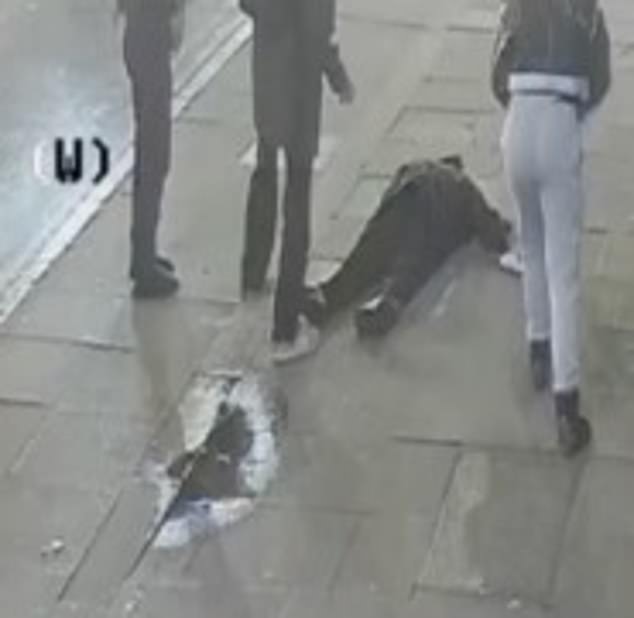 The girls pushed and kicked at the 75-year-old retired hotel worker, taking his glasses to render him more defenceless, before punching him unconscious to the floor (above)