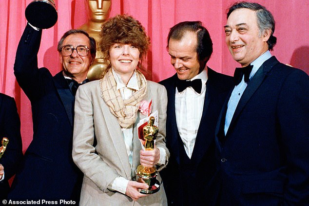 Oscar winners Charles H. Joffe, winner of best picture for Annie Hall, left, and Diane Keaton, winner of best actress for "Annie Hall, at the Academy Awards in 1978