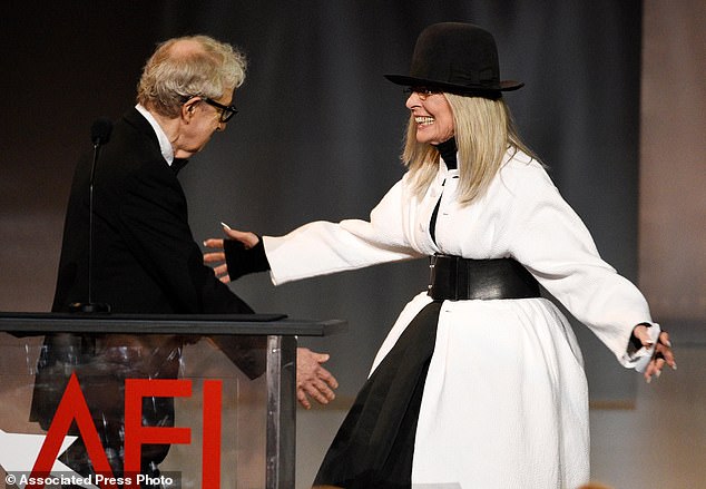 Woody Allen, left, greets Keaton onstage to present her with the 45th AFI Life Achievement Award on June 8, 2017, in Los Angeles